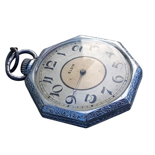 289 - AN ORNATE HEXAGONAL WHITE METAL CASED ELGIN POCKET WATCH (HOUR HAND MISSING)