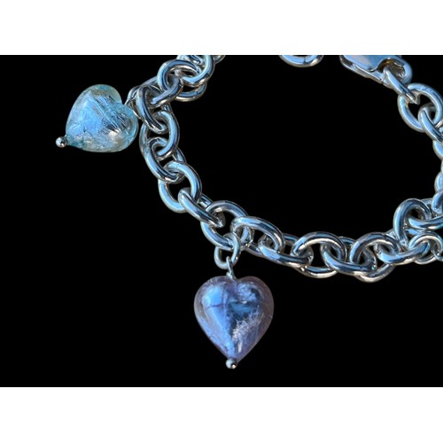 272 - A SILVER BRACELET WITH HEART SHAPED CHARMS