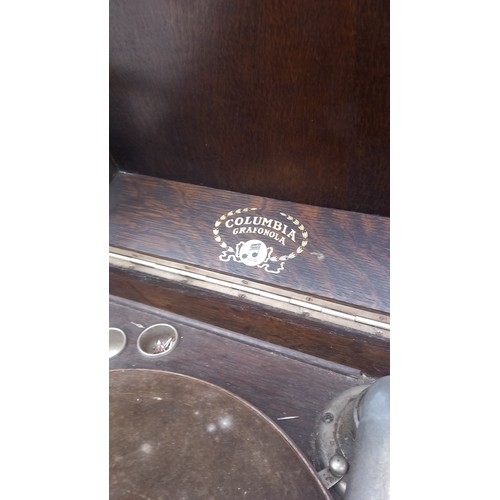 2 - AN ANTIQUE OAK CASED GRAMAPHONE