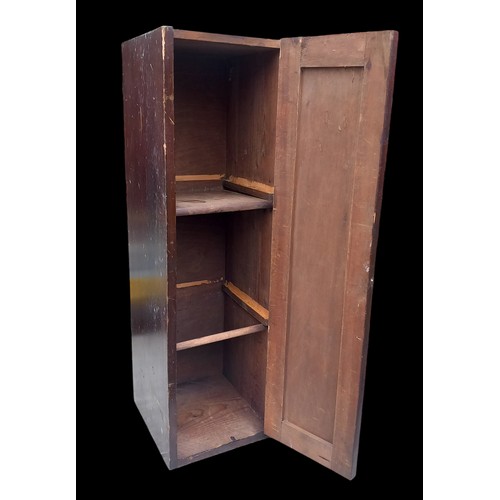 42 - AN ANTIQUE PINE CUPBOARD