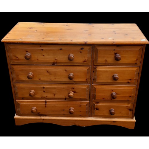 400 - A PINE 8 DRAWERED CHEST OF DRAWERS