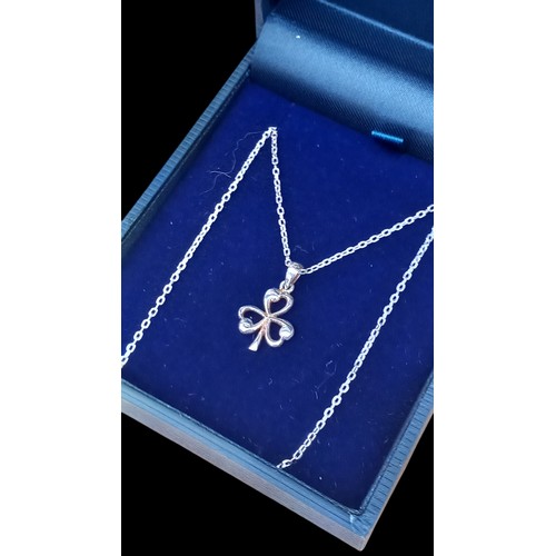 205 - A SILVER SHAMROCK PENDANT ON A SILVER CHAIN