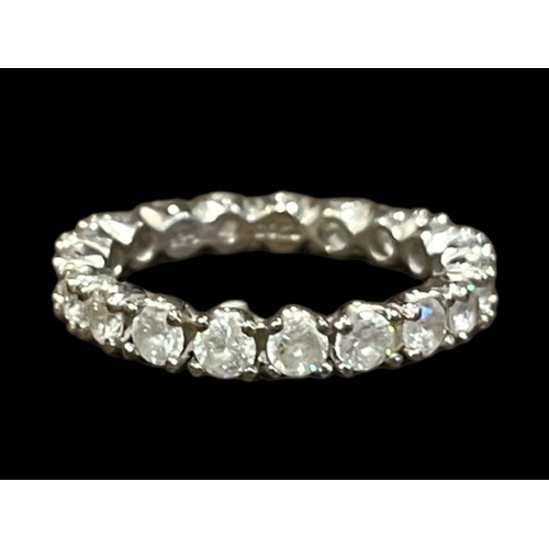 214 - A LOVELY SILVER ETERNITY RING SET WITH BRIGHT CZ STONES