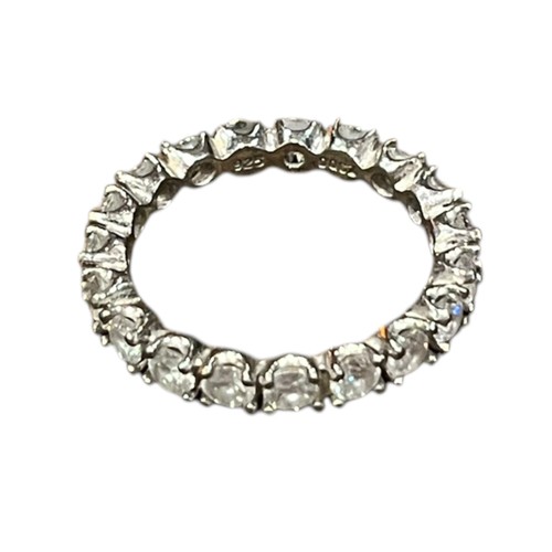 214 - A LOVELY SILVER ETERNITY RING SET WITH BRIGHT CZ STONES