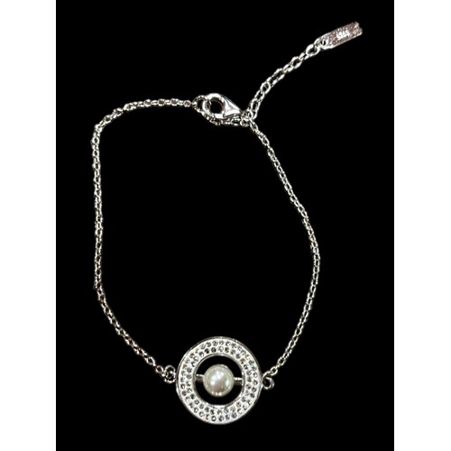 221 - A DESIGNER DORMITH SILVER BRACELET WITH A BEAUTIFUL PEARL AND GEM SET PANEL