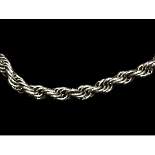 225 - A MULTI STRAND SILVER ROPE BRACELET