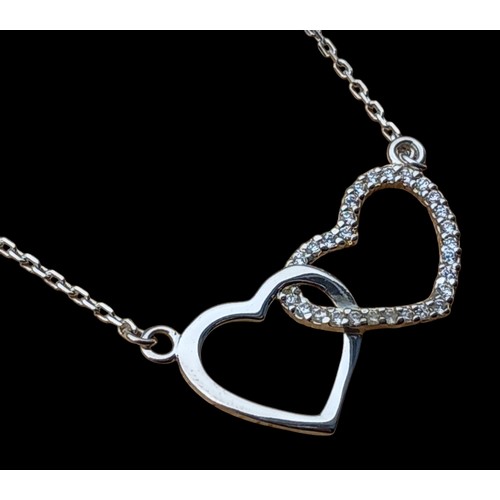 229 - A SILVER DOUBLE HEART NECKLACE