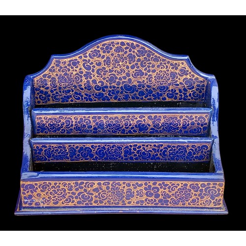 317 - A BEAUTIFULL DECORATIVE BLUE AND GILT PAINTED LETTER RACK 8x7