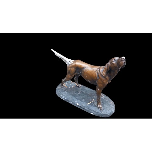 366 - 3 CHALK DOGS OF VARIOUS SIZES (IN A CONVINCING BRONZE FINISH)