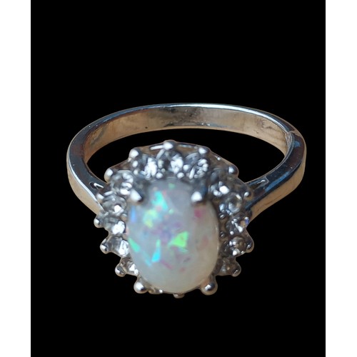 178 - A SILVER GEM SET OPAL STYLE RING