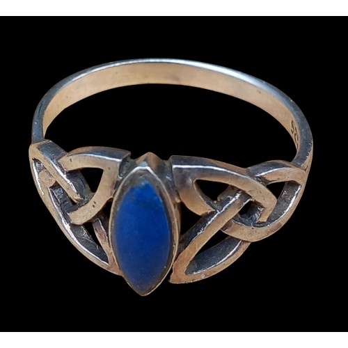 250 - A CELTIC BLUE LAPIS RING