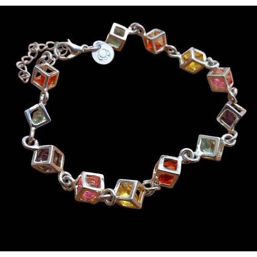 144 - A SILVER MULTI LINK CUBED BRACELET SET WITH DIFFERENT COLOURED STONES