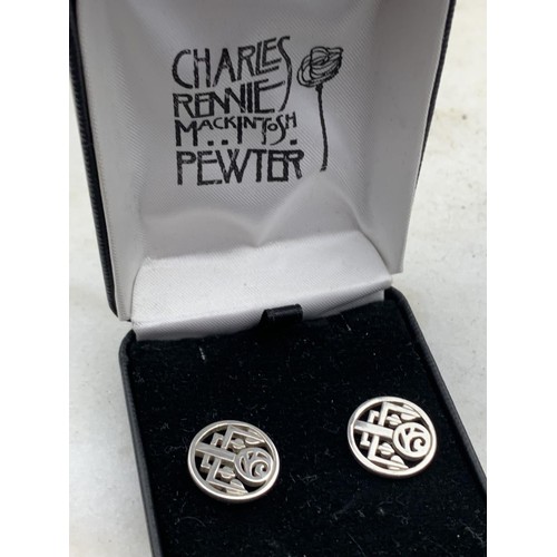 154 - A PAIR OF SILVER RENEE McINTOSH EARRINGS