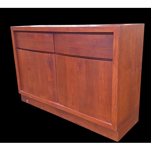 282 - A WALNUT SIDEBOARD OF 2 DRAWERS ABOVE 2 DOORS