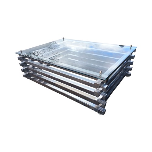 360 - CHROME AND GLASS COFFEE TABLE 35x47