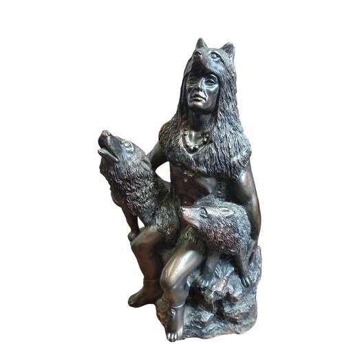 334 - A BRONZED FIGURE OF AMERICAN INDIAN AND 2 WOLVES