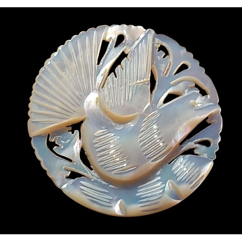 159 - A MOTHER OF PEARL CARVED DOVE BROOCH