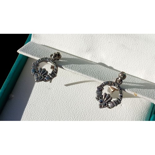 203 - A PAIR OF SILVER MARCASITE CLADDAGH  EARRINGS