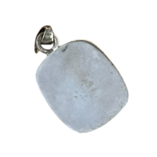 244 - A SILVER MOUNTED TURQUOISE PENDANT