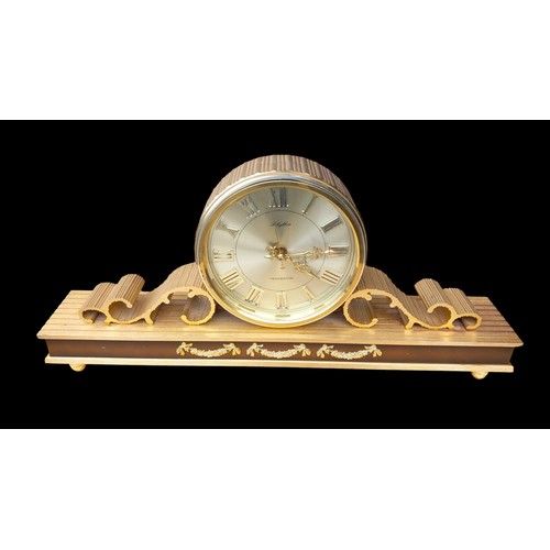 301 - AN ORNATE RHYTHEM TRANSISTOR CLOCK