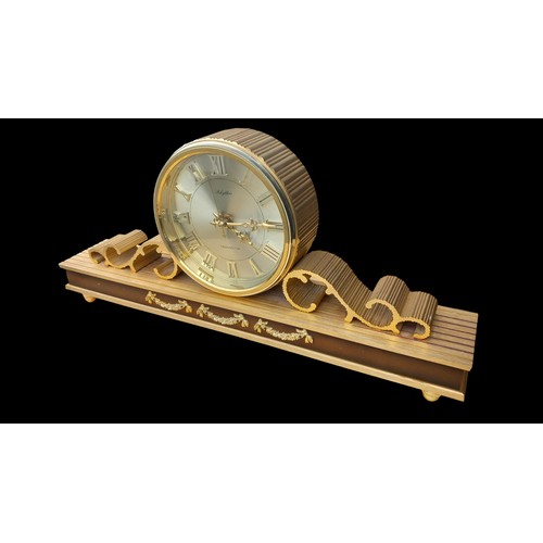 301 - AN ORNATE RHYTHEM TRANSISTOR CLOCK