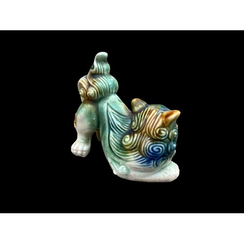 363 - A POTTERY  FOO DOG 4