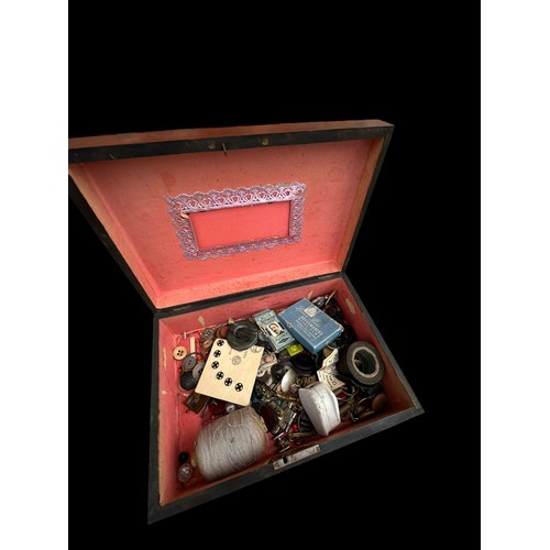 127 - A SMALL ANTIQUE SEWING BOX AND CONTENTS 9X7X3