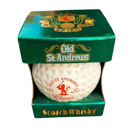 381 - A NEW IN BOX ST ANDREWS GOLF BALL WHISKEY DECANTER