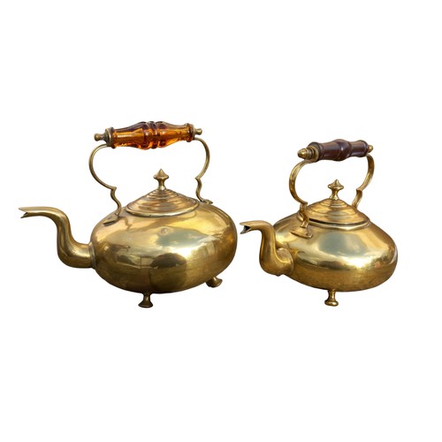 458 - 2 BRASS KETTLE ONE WITH AN AMBER HANDLE