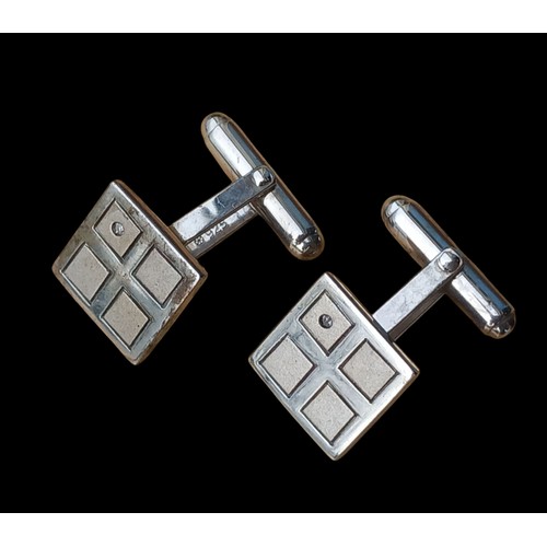 462 - A PAIR OF SILVER CUFFLINKS WITH DIAMOND CHIPS