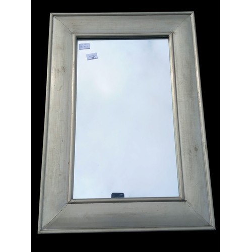 391 - A MODERN INDUSTRIAL STYLE METAL FRAMED MIRROR 30X21