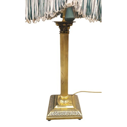 28A - A BRASS CORINTHIAN PILLAR LAMP AND SHADE