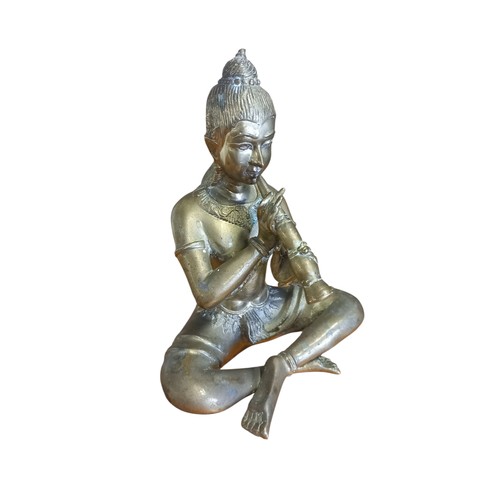 137 - AN ORIENTAL BRONZE OF A MUSICIAN 6.5