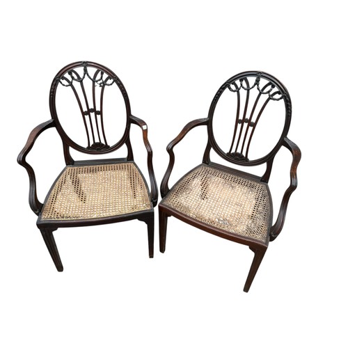 25 - A PAIR OF ORNATELY CARVED BERGER SEATTED CHAIRS (1 HAS REPAIR)