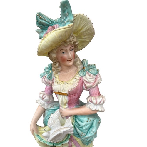 53 - A PAIR OF BISQ FIGURINES 14