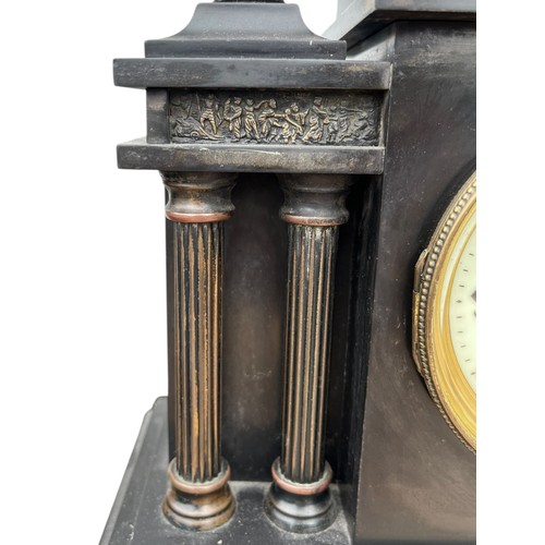125 - A VICTORIAN SLATE CLOCK WITH BRASS PILLARS