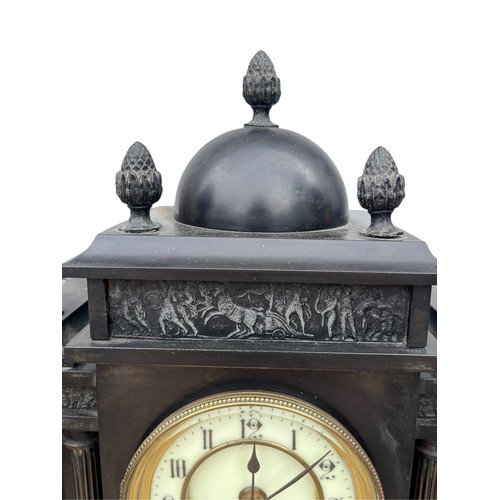 125 - A VICTORIAN SLATE CLOCK WITH BRASS PILLARS