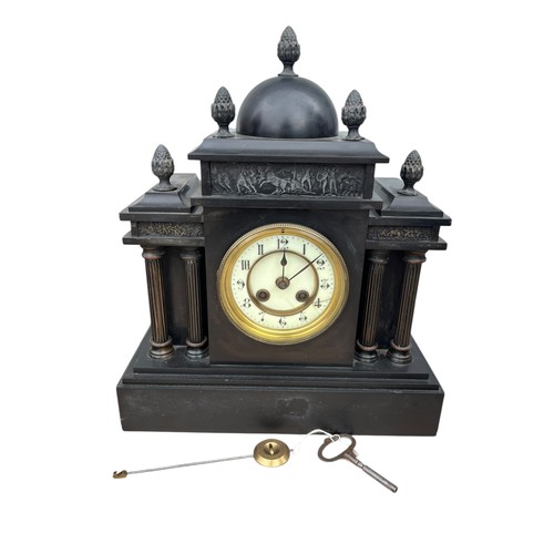 125 - A VICTORIAN SLATE CLOCK WITH BRASS PILLARS