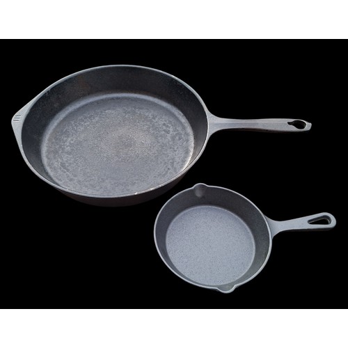61 - 2 CAST IRON FRYING PANS