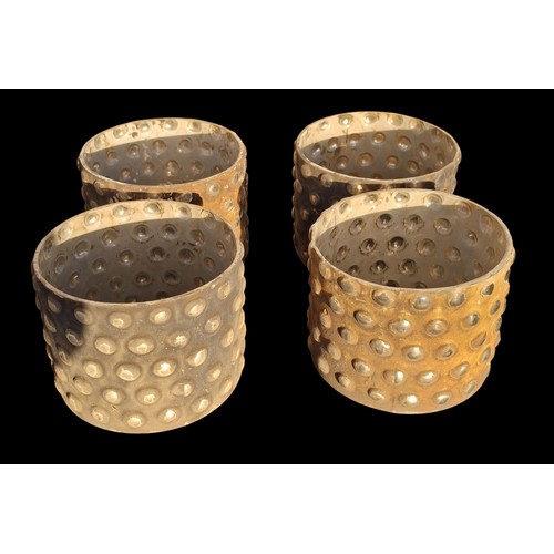 66 - 4 NEW CANDLE HOLDERS