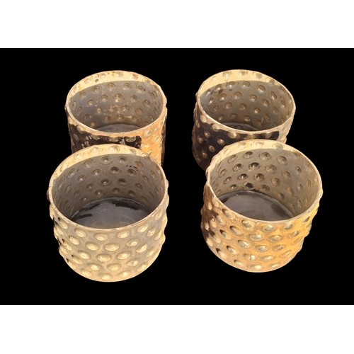 66 - 4 NEW CANDLE HOLDERS