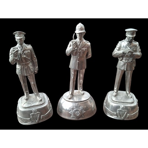 67 - 3 METAL POLICE FIGURINES 4.5