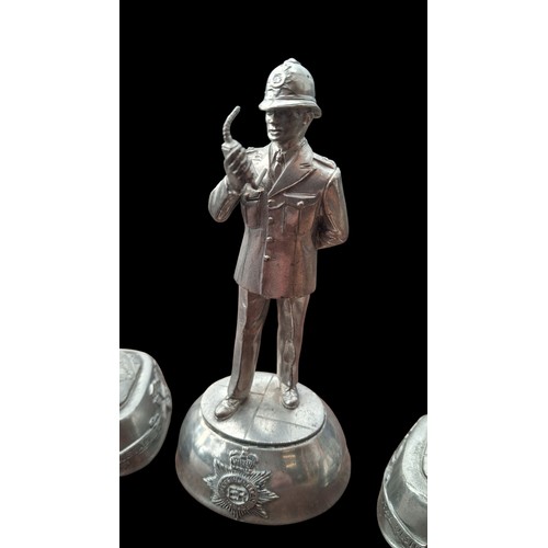 67 - 3 METAL POLICE FIGURINES 4.5