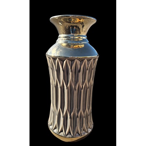 75 - A DESIGNER GILT FINISHED VASE