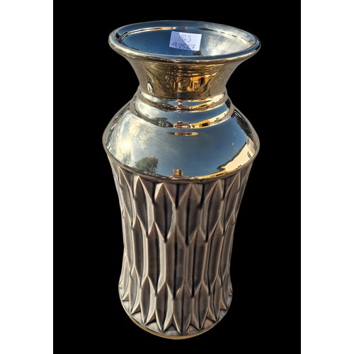 75 - A DESIGNER GILT FINISHED VASE