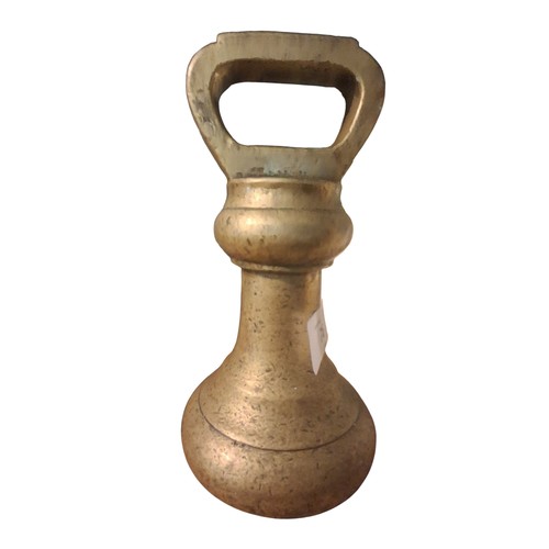 76 - A 7lb BRASS BELL WEIGHT 7