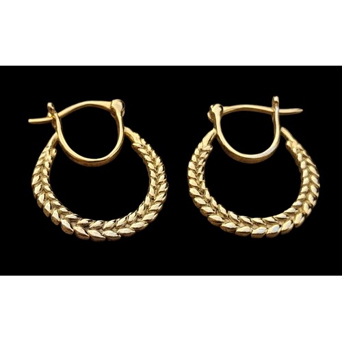 233 - A PAIR GOLD ON SILVER EARRINGS OF GOOD QUALITY