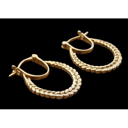 233 - A PAIR GOLD ON SILVER EARRINGS OF GOOD QUALITY