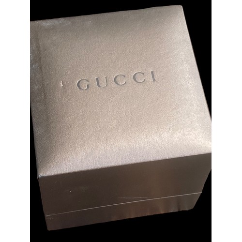 235 - LADIES GUCCI STAINLESS STEEL BANGLE WATCH FEATURE CLASP ,MIRROR PLAIN DIAL  QURTZ AND WORKING SAPPHI... 