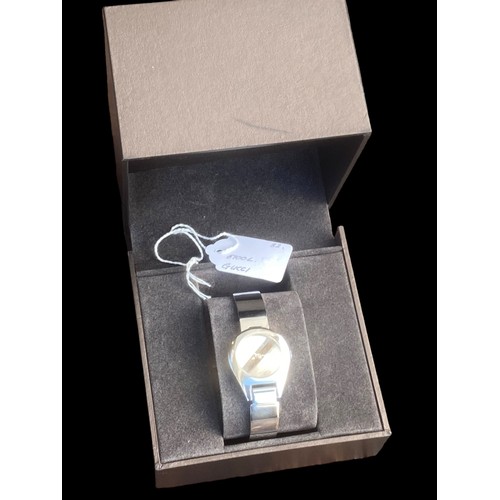 235 - LADIES GUCCI STAINLESS STEEL BANGLE WATCH FEATURE CLASP ,MIRROR PLAIN DIAL  QURTZ AND WORKING SAPPHI... 